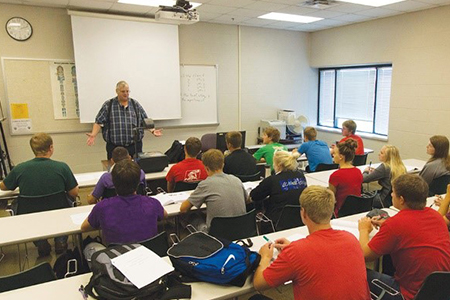 Teacher in front of class at Northeast