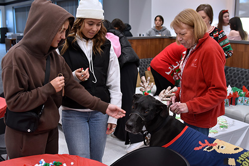 Man’s best friend stops by Northeast to give students some holiday cheer