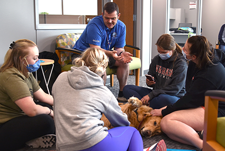 Comfort dogs live up to their name in visit to Northeast 