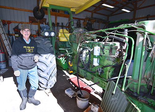 Lifelong learner has winning bid on tractor donated to Northeast campaign